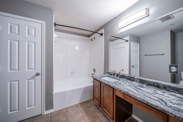 4928 Heather Glen Trl, Mckinney, TX 75070 - bathroom featuring tile patterned flooring, vanity, washtub / shower combination, and toilet