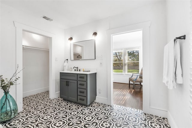 2511 Lipscomb St, Fort Worth, TX 76110 - bathroom with vanity and baseboards