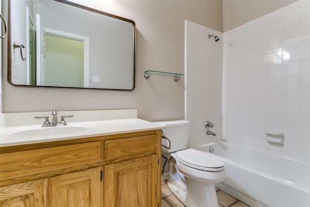bathroom with toilet, vanity, tile patterned floors, and shower / bathtub combination