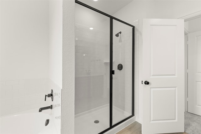 702 Roanoke, Princeton, TX 75407 - bathroom with a stall shower and a bath