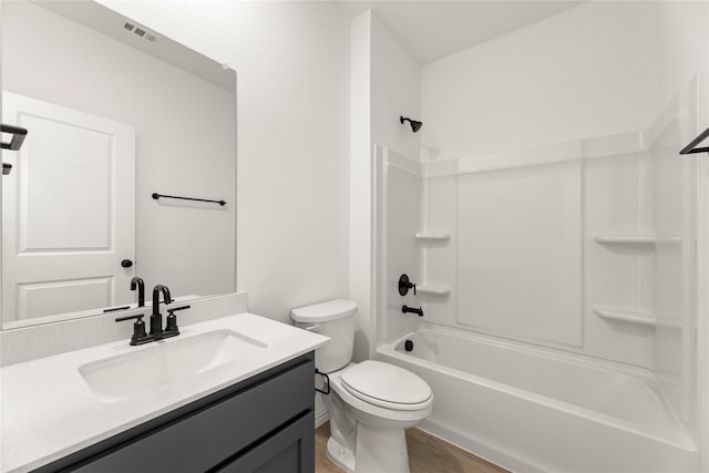 702 Roanoke, Princeton, TX 75407 - bathroom with wood finished floors, toilet, vanity, and  shower combination