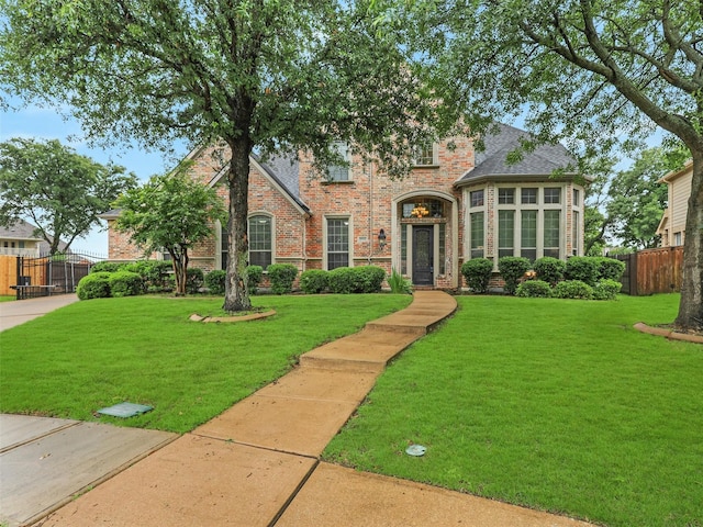 6769 Canal Ct, Grand Prairie, TX 75054 - view of front of property featuring brick siding and a shingled roof