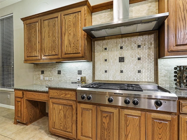 6769 Canal Ct, Grand Prairie, TX 75054 - kitchen featuring extractor fan, stainless steel gas cooktop, and brown cabinetry