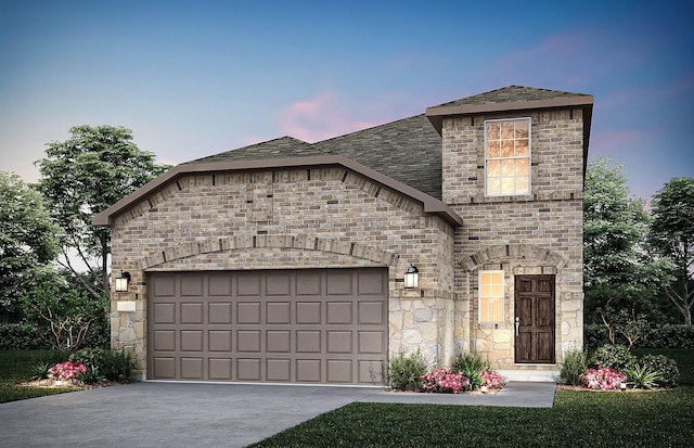 1053 Clear Dusk Ln, Forney, TX 75126 - french country style house with stone siding, a garage, driveway, and a shingled roof