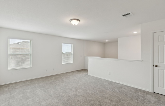 1053 Clear Dusk Ln, Forney, TX 75126 - carpeted spare room with baseboards and recessed lighting