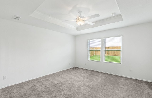 1053 Clear Dusk Ln, Forney, TX 75126 - unfurnished room with a tray ceiling, carpet, ornamental molding, ceiling fan, and a smoke detector