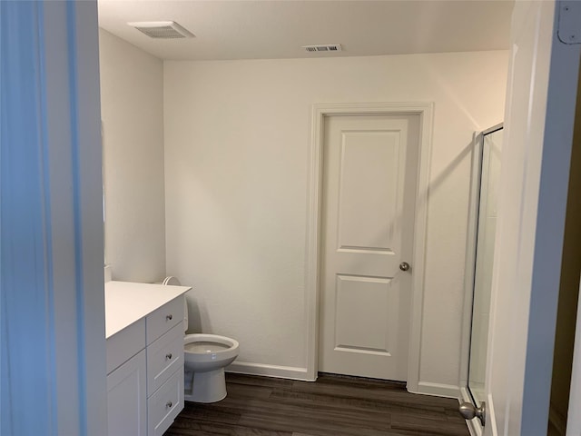 2617 Silver Leaf Ln, Anna, TX 75409 - full bath featuring baseboards, a shower stall, wood finished floors, toilet, and vanity