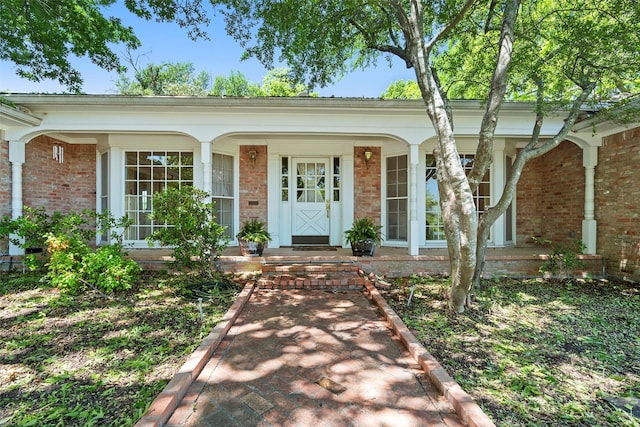 214 Country Club Rd, Hillsboro, TX 76645 - view of front of home with brick siding and covered porch