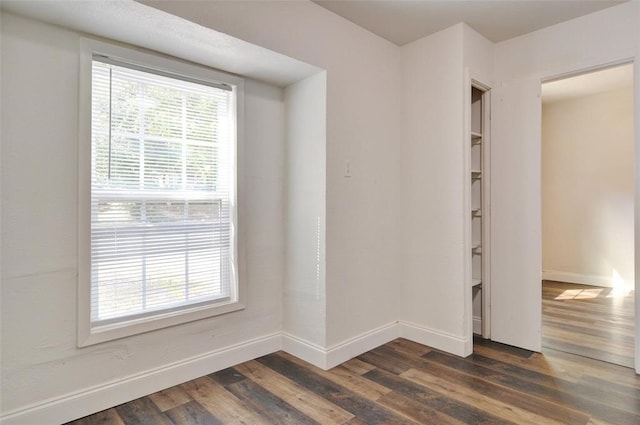 4363 Lisbon St, Fort Worth, TX 76107 - empty room featuring dark wood finished floors and baseboards