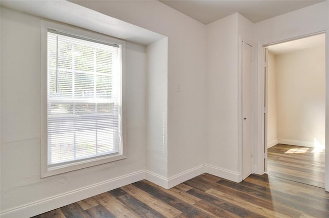4363 Lisbon St, Fort Worth, TX 76107 - spare room featuring plenty of natural light, baseboards, and dark wood-type flooring