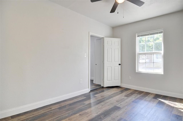 4363 Lisbon St, Fort Worth, TX 76107 - unfurnished room with a ceiling fan, dark wood-type flooring, and baseboards