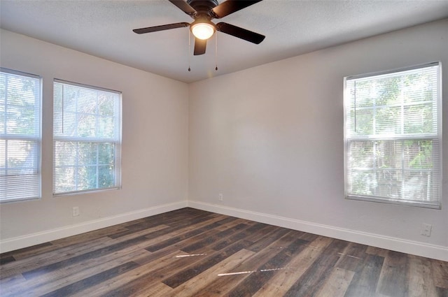 4363 Lisbon St, Fort Worth, TX 76107 - spare room featuring healthy amount of natural light, baseboards, dark wood-style flooring, a ceiling fan, and a textured ceiling