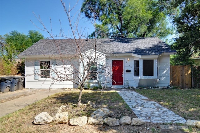 4363 Lisbon St, Fort Worth, TX 76107 - view of front of property featuring fence and a shingled roof