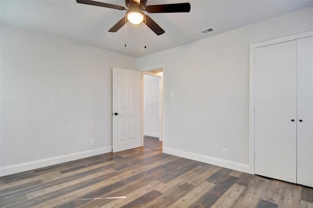 4363 Lisbon St, Fort Worth, TX 76107 - unfurnished bedroom featuring wood finished floors, baseboards, a closet, and ceiling fan