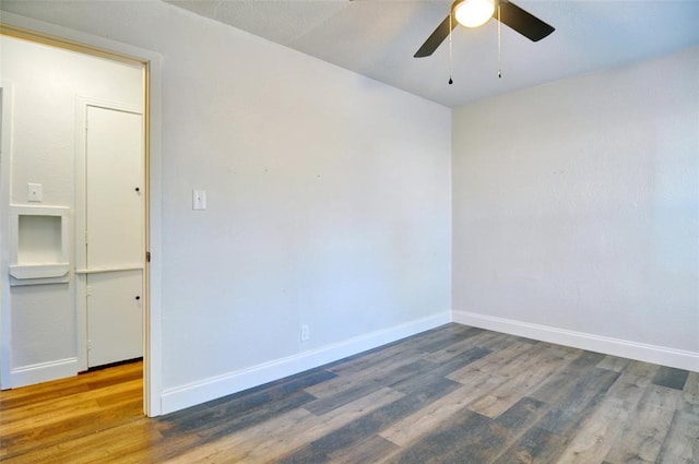 4363 Lisbon St, Fort Worth, TX 76107 - empty room with wood finished floors, a ceiling fan, and baseboards