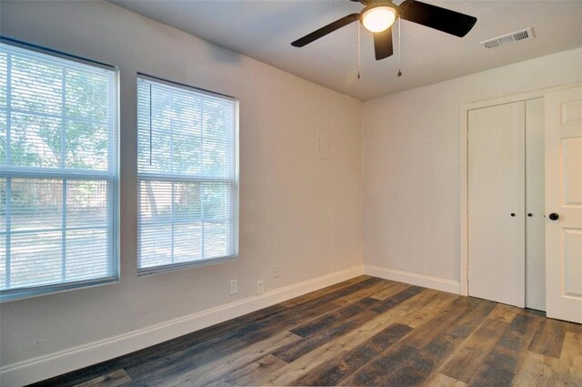 4363 Lisbon St, Fort Worth, TX 76107 - spare room featuring dark wood finished floors, ceiling fan, and baseboards