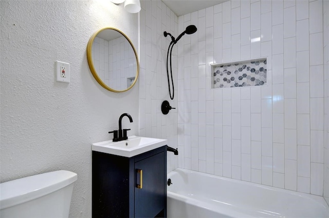 4363 Lisbon St, Fort Worth, TX 76107 - bathroom featuring shower / bathtub combination, toilet, a textured wall, and vanity