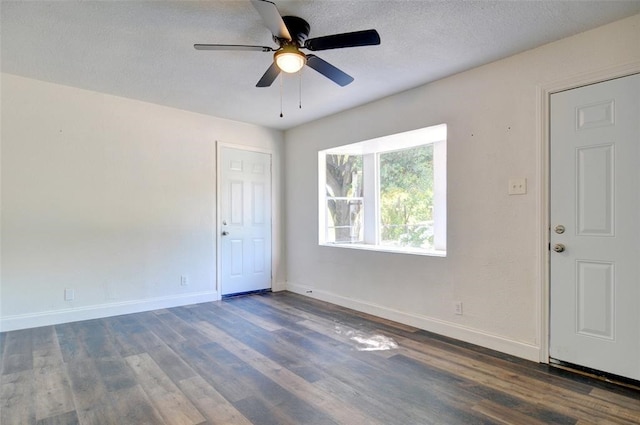 4363 Lisbon St, Fort Worth, TX 76107 - unfurnished room with wood finished floors, a ceiling fan, baseboards, and a textured ceiling