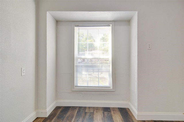 4363 Lisbon St, Fort Worth, TX 76107 - empty room featuring baseboards and dark wood-style flooring