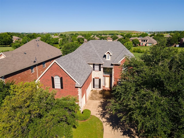 10101 Waterview Pkwy, Rowlett, TX 75089 - view of front of property featuring brick siding, driveway, and a garage