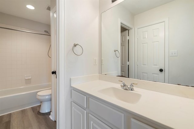 10101 Waterview Pkwy, Rowlett, TX 75089 - bathroom with wood finished floors, toilet, vanity, and shower / bath combination