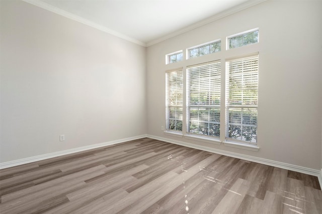 10101 Waterview Pkwy, Rowlett, TX 75089 - unfurnished room with wood finished floors, baseboards, and ornamental molding