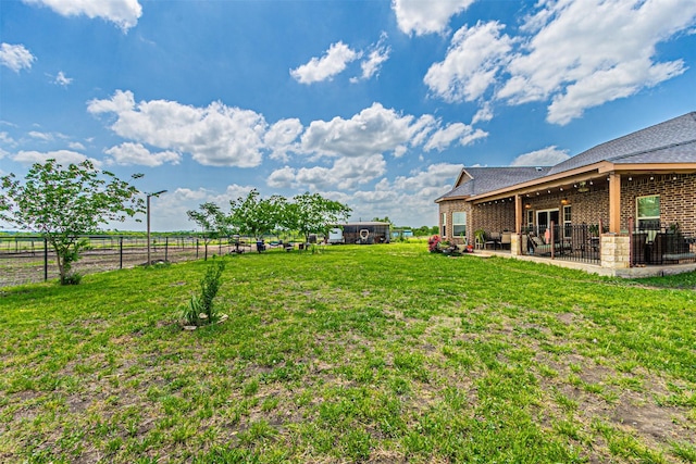 view of yard featuring a patio
