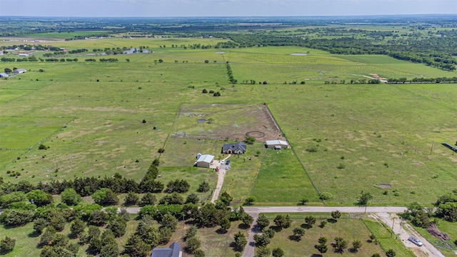 aerial view of property's location with rural landscape and a pastoral area