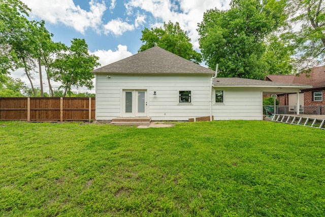 608 N Belknap, Stephenville, TX 76401 - rear view of house featuring roof with shingles and entry steps