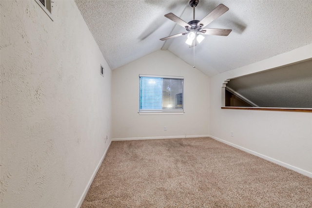 410 Lone Oak Cir, Euless, TX 76039 - bonus room featuring a textured ceiling, lofted ceiling, carpet, a ceiling fan, and baseboards