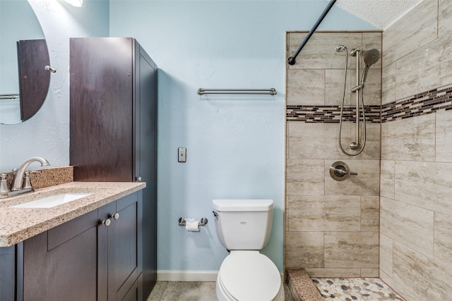 410 Lone Oak Cir, Euless, TX 76039 - full bathroom with tiled shower, toilet, and vanity