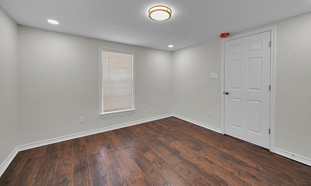 2709 Sarah St, Waco, TX 76706 - unfurnished room featuring dark wood finished floors, baseboards, and recessed lighting