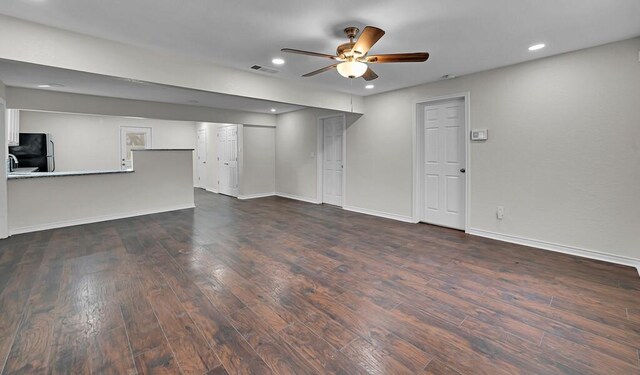 2709 Sarah St, Waco, TX 76706 - unfurnished living room with a ceiling fan, dark wood finished floors, baseboards, and recessed lighting