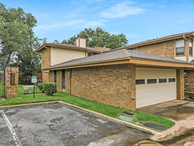 19 Park Ln, Bedford, TX 76021 - view of home's exterior featuring brick siding and a chimney