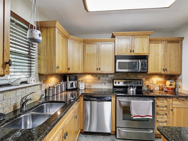 19 Park Ln, Bedford, TX 76021 - kitchen featuring appliances with stainless steel finishes, a sink, tasteful backsplash, dark stone counters, and light brown cabinets
