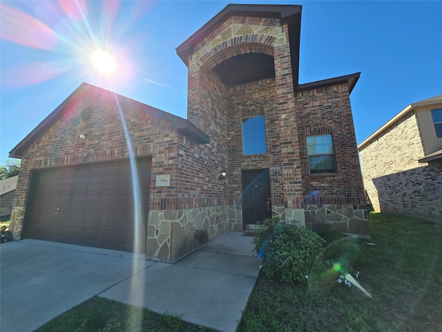 556 Pleasant Park Dr, Wilmer, TX 75172 - view of front of property with brick siding, a garage, concrete driveway, and stone siding