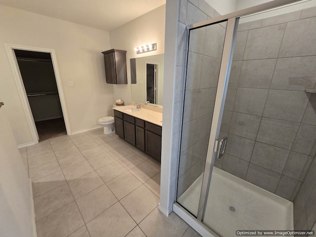 556 Pleasant Park Dr, Wilmer, TX 75172 - bathroom with a stall shower, tile patterned flooring, baseboards, and vanity