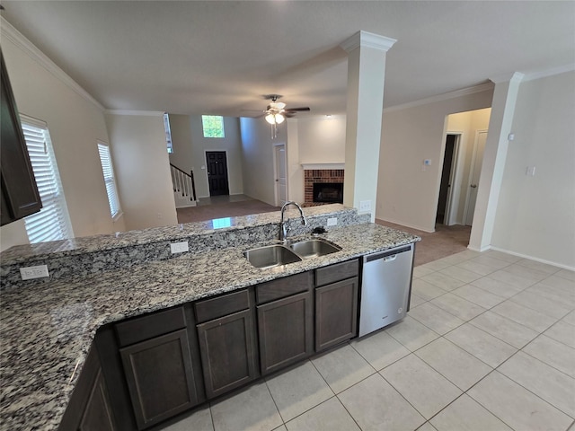556 Pleasant Park Dr, Wilmer, TX 75172 - kitchen featuring a sink, dishwasher, ceiling fan, a brick fireplace, and open floor plan