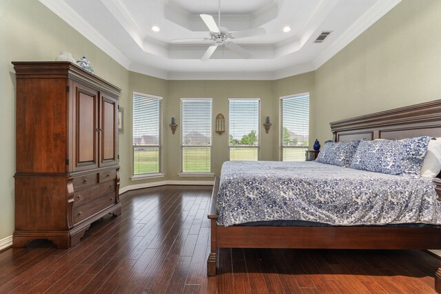 11109 Brook Green Ln, Haslet, TX 76052 - bedroom featuring dark wood finished floors, crown molding, a ceiling fan, baseboards, and a raised ceiling