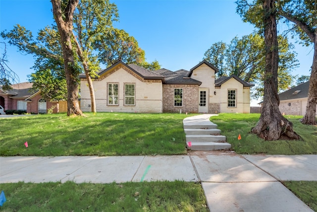 1408 Spinnaker Ln, Azle, TX 76020 - view of front of property with a front lawn and brick siding