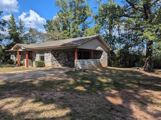 11728 Fm 1399, Marietta, TX 75566 - view of front facade with brick siding and a front yard