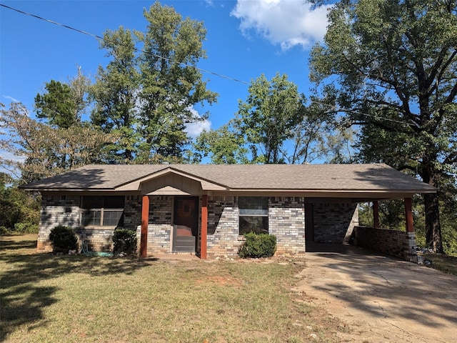 11728 Fm 1399, Marietta, TX 75566 - view of front of property with concrete driveway, a front lawn, a carport, and brick siding
