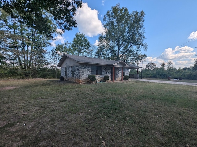 11728 Fm 1399, Marietta, TX 75566 - view of front facade with a front lawn and brick siding
