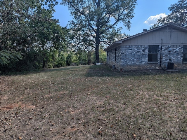 11728 Fm 1399, Marietta, TX 75566 - view of green lawn featuring central air condition unit