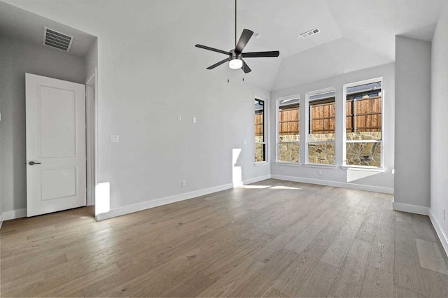 4316 Sandbrock Pkwy, Aubrey, TX 76227 - empty room featuring a ceiling fan, wood finished floors, and lofted ceiling