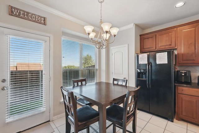 4127 Nia Dr, Irving, TX 75038 - dining room featuring light tile patterned floors, a chandelier, crown molding, recessed lighting, and baseboards