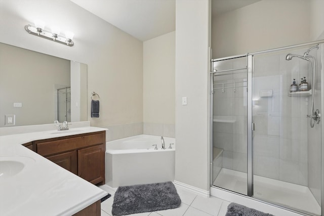 4127 Nia Dr, Irving, TX 75038 - full bathroom featuring tile patterned flooring, a shower stall, vanity, a garden tub, and baseboards