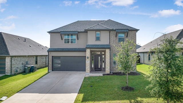 628 Hidden Cove Dr, Princeton, TX 75407 - view of front facade with concrete driveway, an attached garage, brick siding, and a front lawn