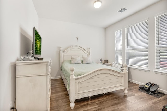 628 Hidden Cove Dr, Princeton, TX 75407 - bedroom featuring wood finished floors and baseboards
