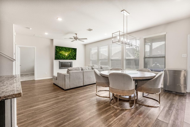 628 Hidden Cove Dr, Princeton, TX 75407 - dining space featuring wood finished floors, healthy amount of natural light, ceiling fan, and recessed lighting